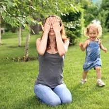 mom and daughter playing hide and seek